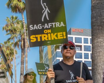 Members Of SAG-AFTRA and WGA on strike at Netflix's office Sunset Bronson Studios — both owned by Hudson Pacific — in Hollywood.