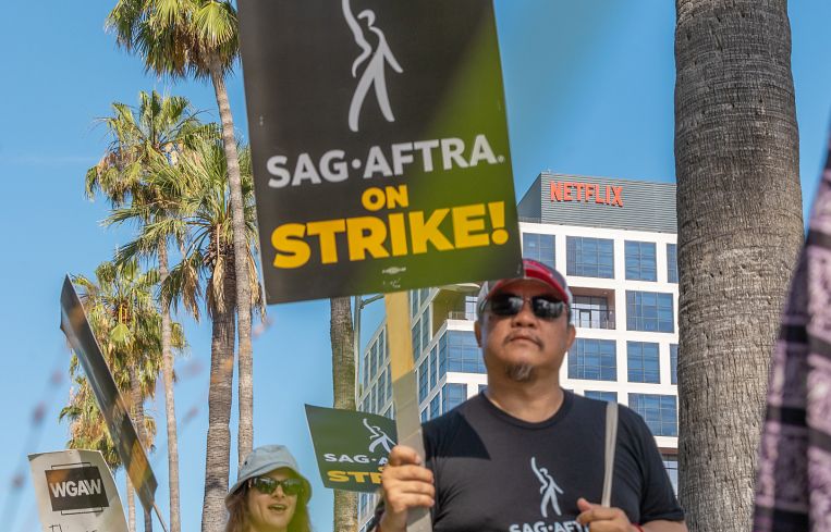 Members Of SAG-AFTRA and WGA on strike at Netflix's office Sunset Bronson Studios — both owned by Hudson Pacific — in Hollywood.