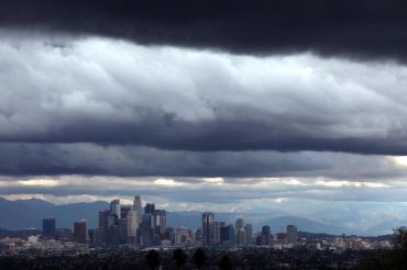 Storms pass over Downtown Los Angeles on the first day of winter.