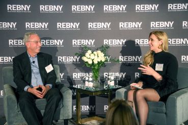Barry Gosin discusses the state of the commercial real estate market with Cathy Cunningham, executive editor at Commercial Observer, at the 2023 REBNY commercial brokerage holiday luncheon at the The Metropolitan Club in Manhattan. 