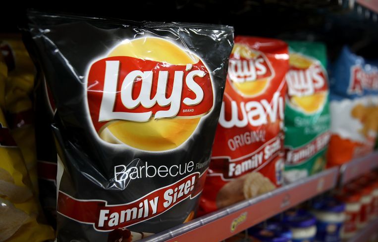 Frito Lay products on a store shelf