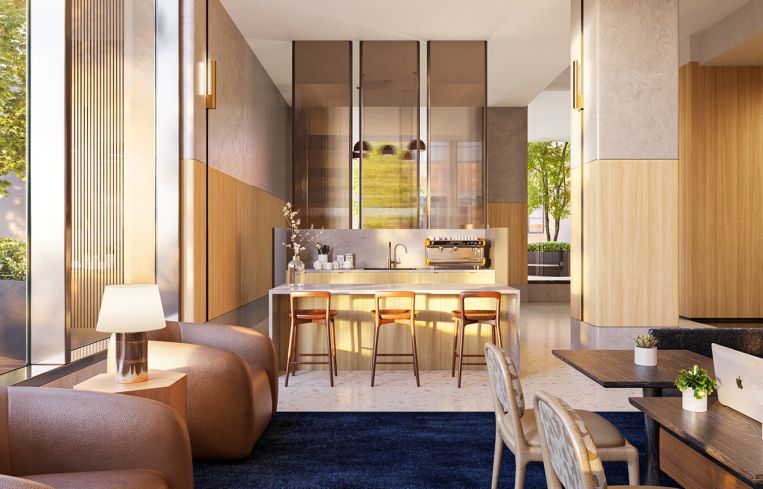 Work includes a new residential lobby with a grand staircase leading to basement amenities, as well as a cafe for tenants.