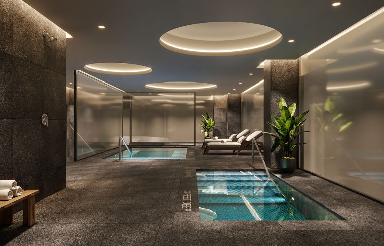 Downstairs is a plunge pool and spa, which are part of a larger amenity space in the basement.