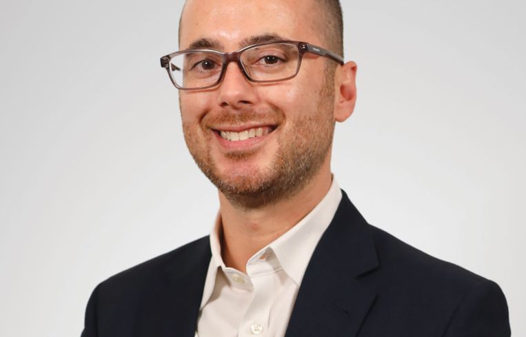 A person in a suit.