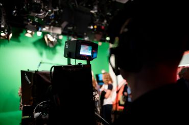 Television recordings in front of the Green Screen in a studio.