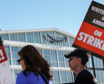 Supporters of the Writers Guild of America picket in front of Culver Studios, home of Amazon Studios, in 2023 in Culver City.