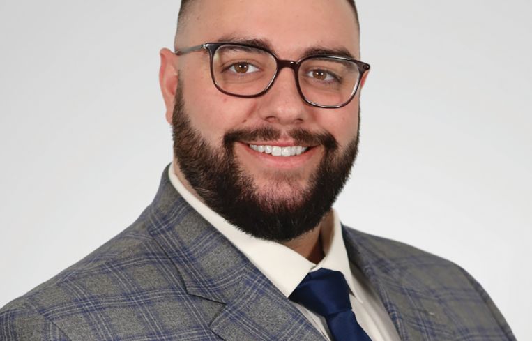 A person in a plaid suit.
