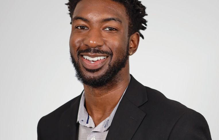 A person in a suit.
