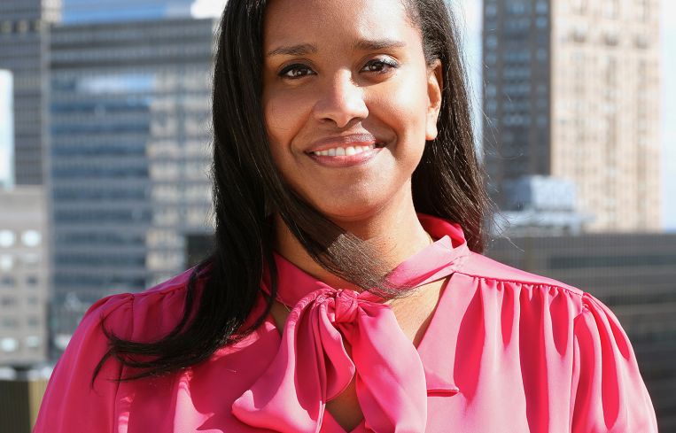 A person in a pink shirt.