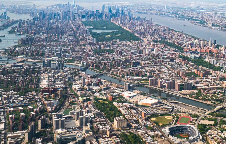 Aerial View Of Mott Haven and the New York City Skyline.