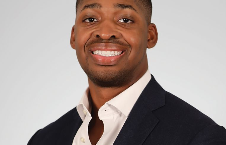 A person in a suit.