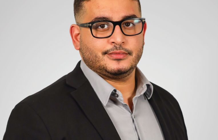 A person in a suit.