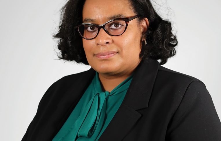 A person in a suit.
