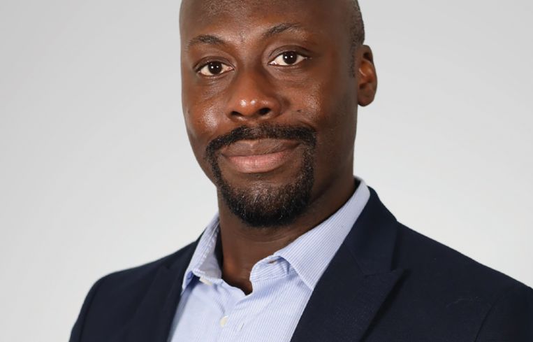 A person in a suit.