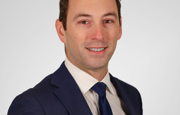 A person in a suit.