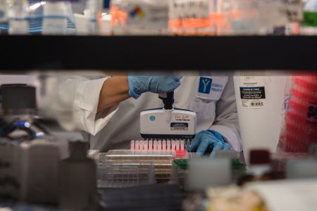 An employee works in the lab at Sorrento Therapeutics in San Diego, California.