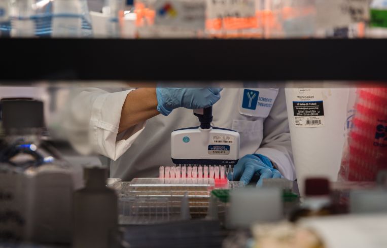 An employee works in the lab at Sorrento Therapeutics in San Diego, California.