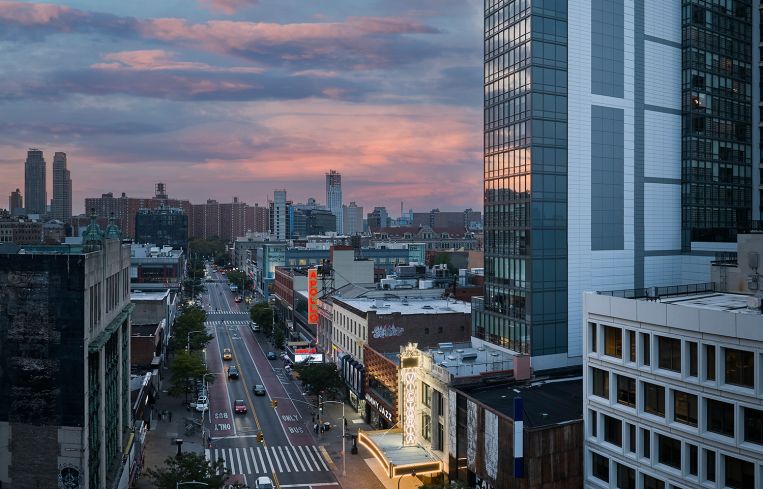 The view of the Victoria Theater development along 125th Street.