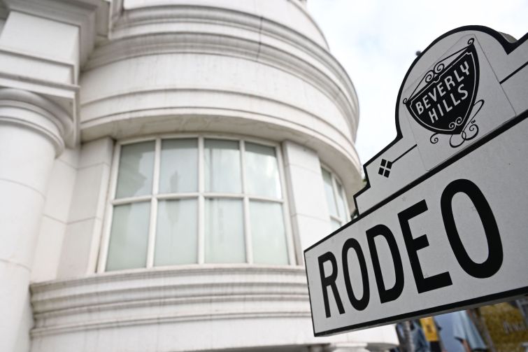 Rodeo Drive street sign stands on the corner of the site of the rejected plan for a Cheval Blanc Hotel from LVMH Moet Hennessy Louis Vuitton in Beverly Hills.