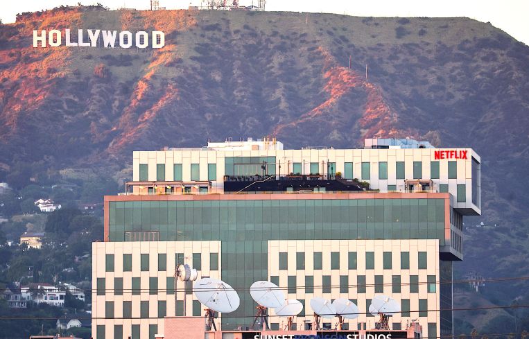 Netflix offices and Sunset Bronson Studios (both owned by HPP) are seen in front of the Hollywood in Los Angeles.