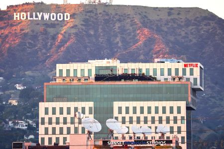 Netflix offices and Sunset Bronson Studios (both owned by HPP) are seen in front of the Hollywood in Los Angeles.