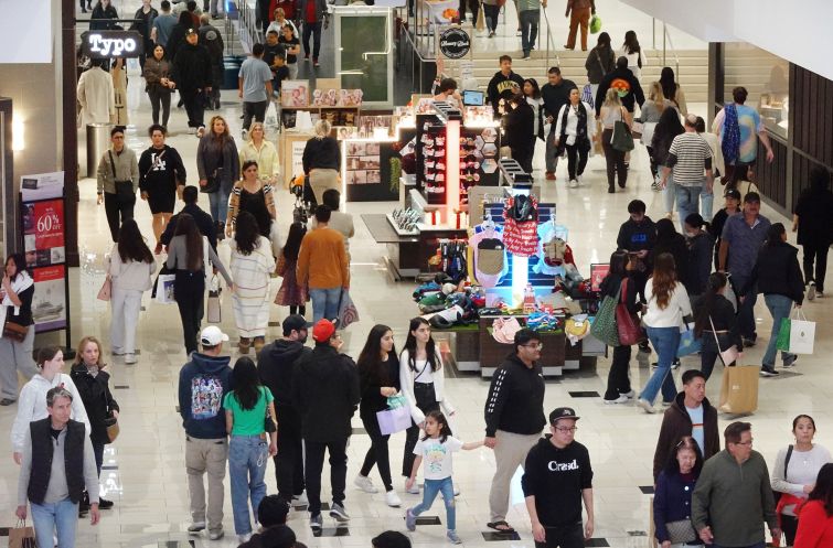 People shop in the Glendale Galleria shopping mall.