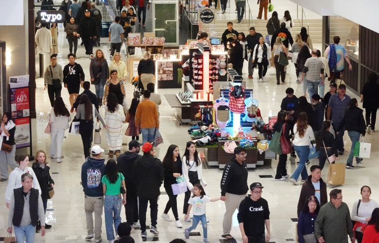People shop in the Glendale Galleria shopping mall.