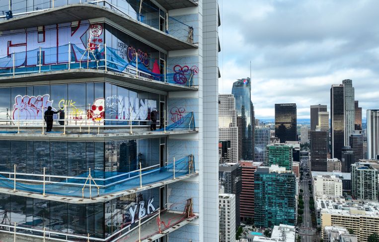 Construction on Oceanwide Plaza, a $1 billion mixed-use retail and luxury apartments project with three towering unfinished structures, stalled in January 2019 after the Beijing-based developer lacked the funds to complete it.