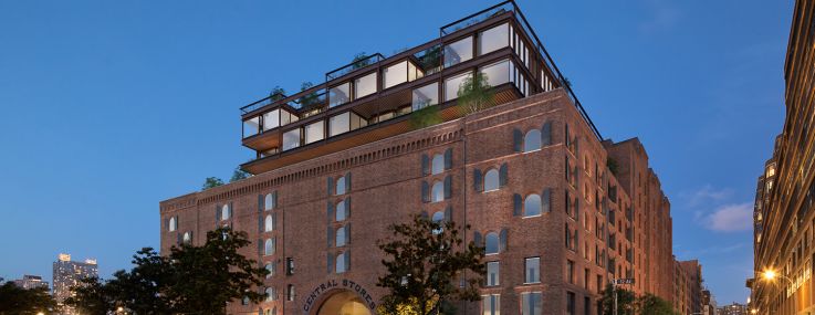 The conversion of the 1.2-million-square-foot Terminal Warehouse into office involves a new six-story addition painted in bright red and yellow.
