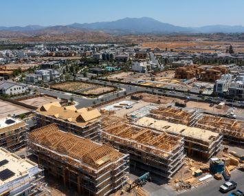 An aerial view of workers constructing new homes in The Great Park Neighborhoods in Irvine.