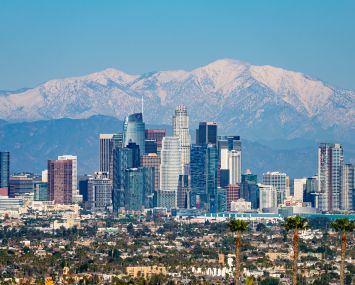 The Downtown Los Angeles skyline against the San Gabriel Mountains on February 11.