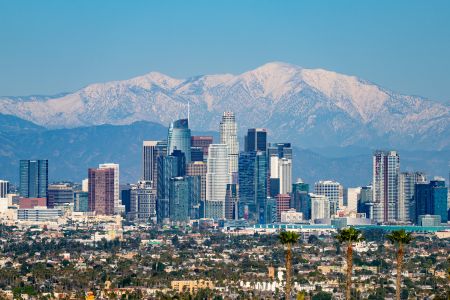 The Downtown Los Angeles skyline against the San Gabriel Mountains on February 11.