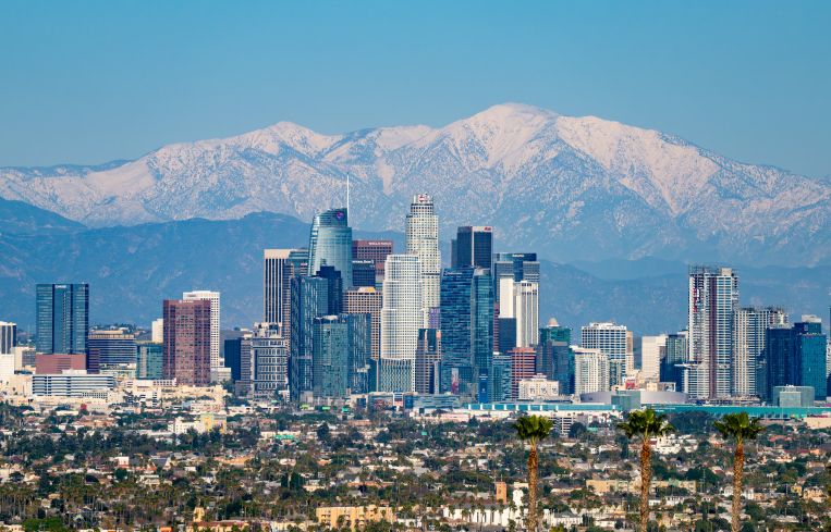 The Downtown Los Angeles skyline against the San Gabriel Mountains on February 11.