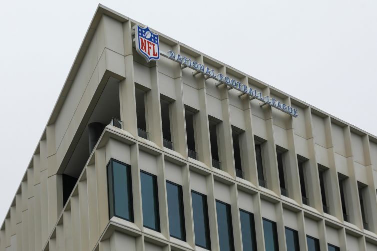 The NFL network headquarters building with an NFL shield logo displayed in Inglewood.