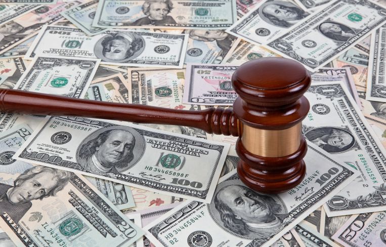 Dollars and gavel.
