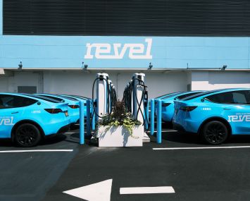 A charging station for the newly launched app-based car service Revel stands in a Brooklyn neighborhood on August 02, 2021 in New York City.