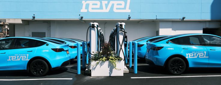 A charging station for the newly launched app-based car service Revel stands in a Brooklyn neighborhood on August 02, 2021 in New York City.