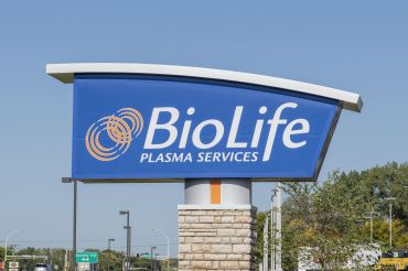 A blue sign that says "BioLife Plasma Services."