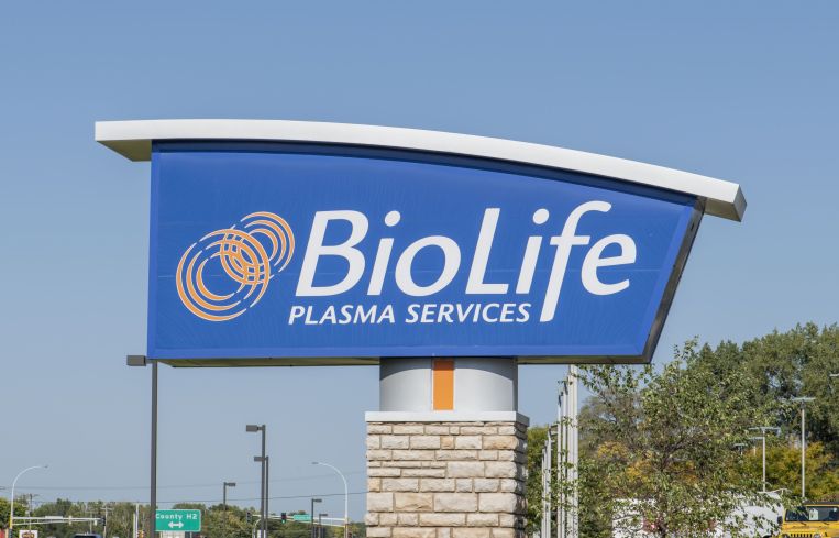 A blue sign that says "BioLife Plasma Services."