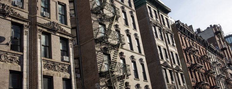 A row of apartment buildings in New York City.