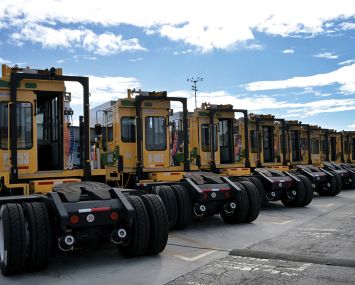 A storage yard for construction vehicles in California.