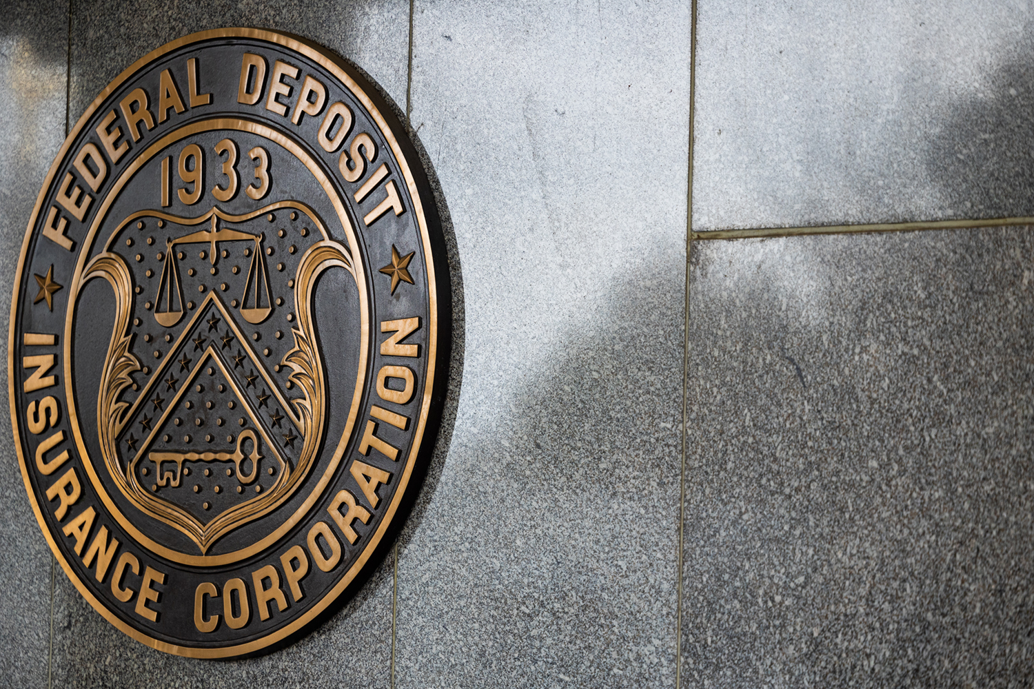 Logo on the outside of the Federal Deposit Insurance Corp. (FDIC) building in Washington, D.C.
