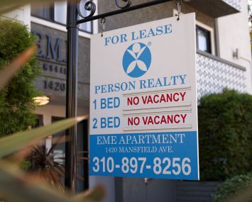 A 'no vacancy' sign for rentals is displayed outside an apartment building in Los Angeles, California.