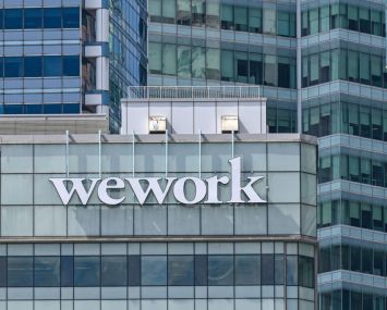 A WeWork logo on a building