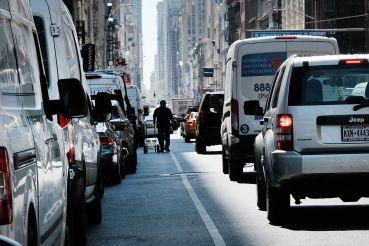 Traffic moves through downtown Manhattan