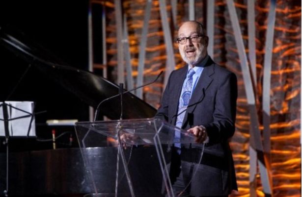 Azorim Chairman Hershey Friedman speaking at the opening of the firm's second residential tower in Yonkers in 2019.