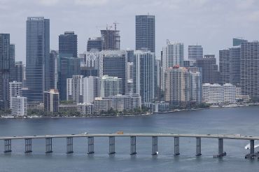 An aerial view of the City of Miami skyline is seen next to Biscayne Bay.