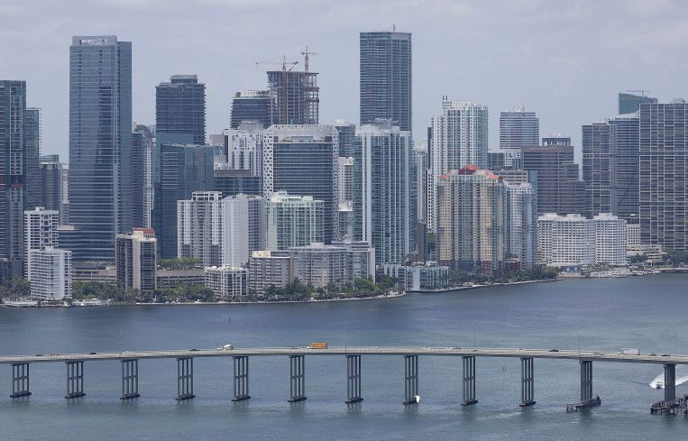 An aerial view of the City of Miami skyline is seen next to Biscayne Bay.