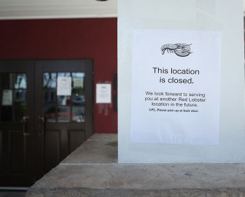 A sign announcing the closure posted on the front of a Red Lobster restaurant in Fremont, California.