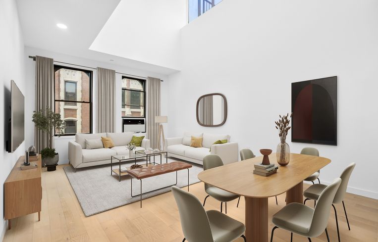 A living room with a skylight.